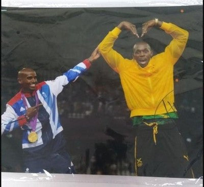 Usain Bolt Celebrating Signed 16x12 Photo Olympic Legend Collectible Item