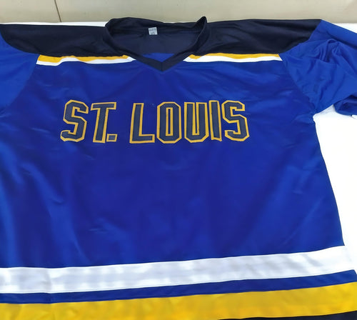 قميص موقّع من بريت هال وآدم أوتس معتمد من بيكيت من عظماء NHL
